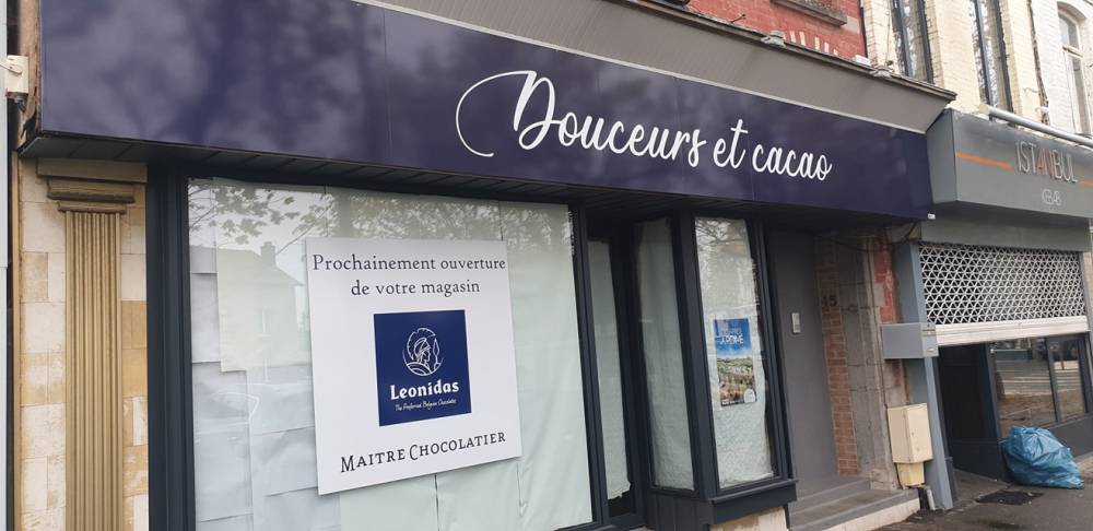 batiment avec l'enseigne pour douceur et cacao a aulnoye aymerie